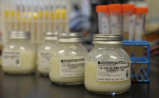 Donated breastmilk is pooled and pasteurized to kill any bacteria or viruses then stored in bottles with tracking codes.